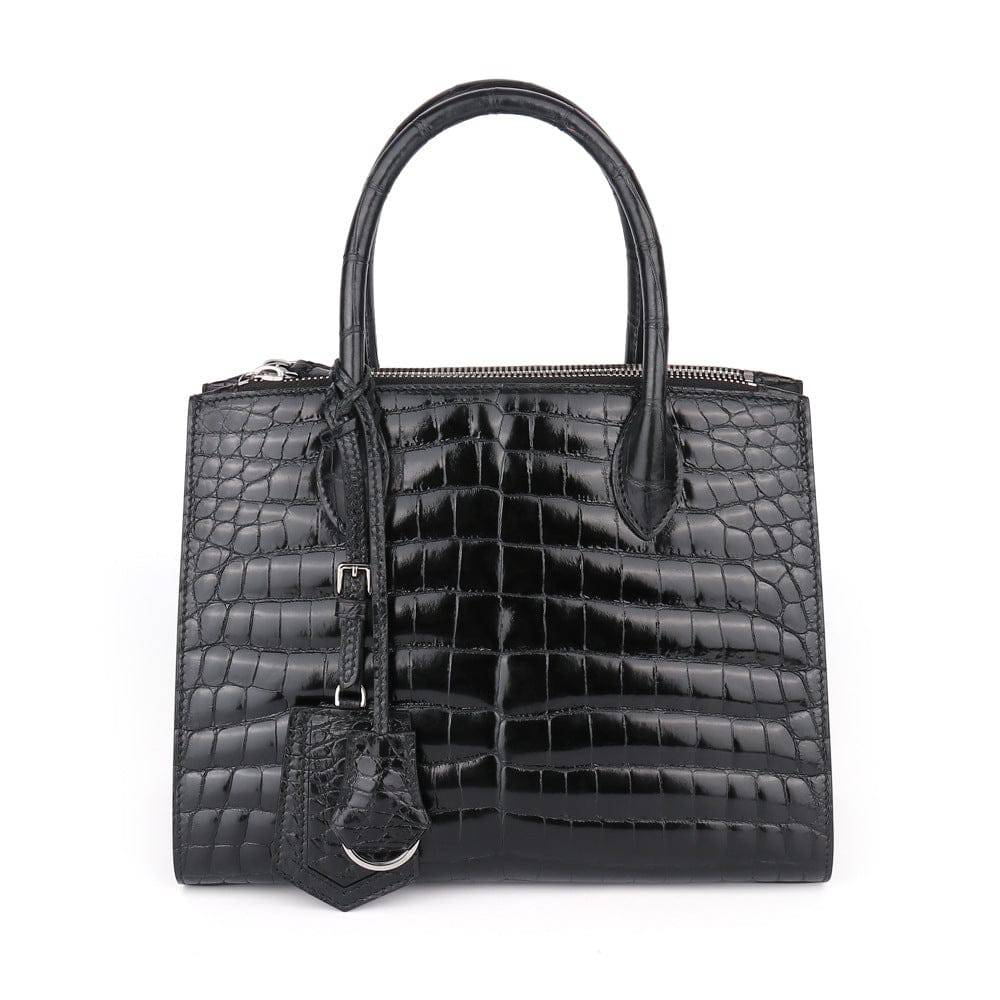 Shiny crocodile skin leather handbag by Rossie Viren with beaded accents, featuring a crossbody strap and top handle design.