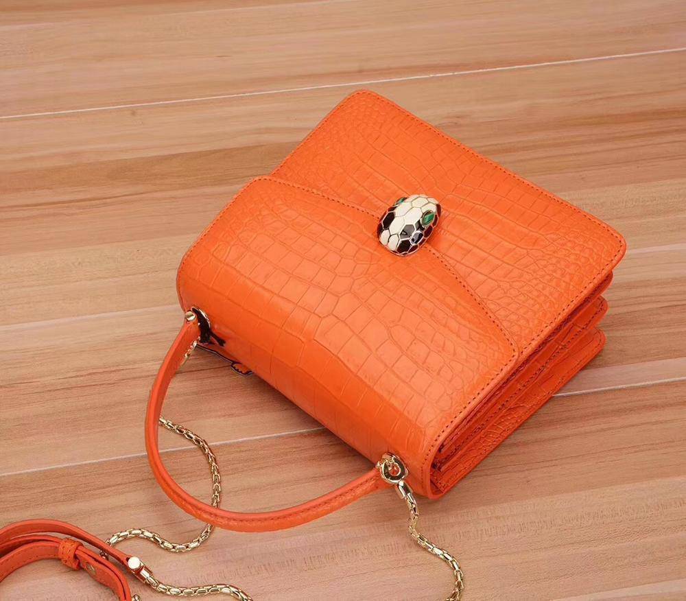Rossie Viren crocodile leather women's chain crossbody handbag with flap closure, stylish shoulder bag for elegant everyday wear.