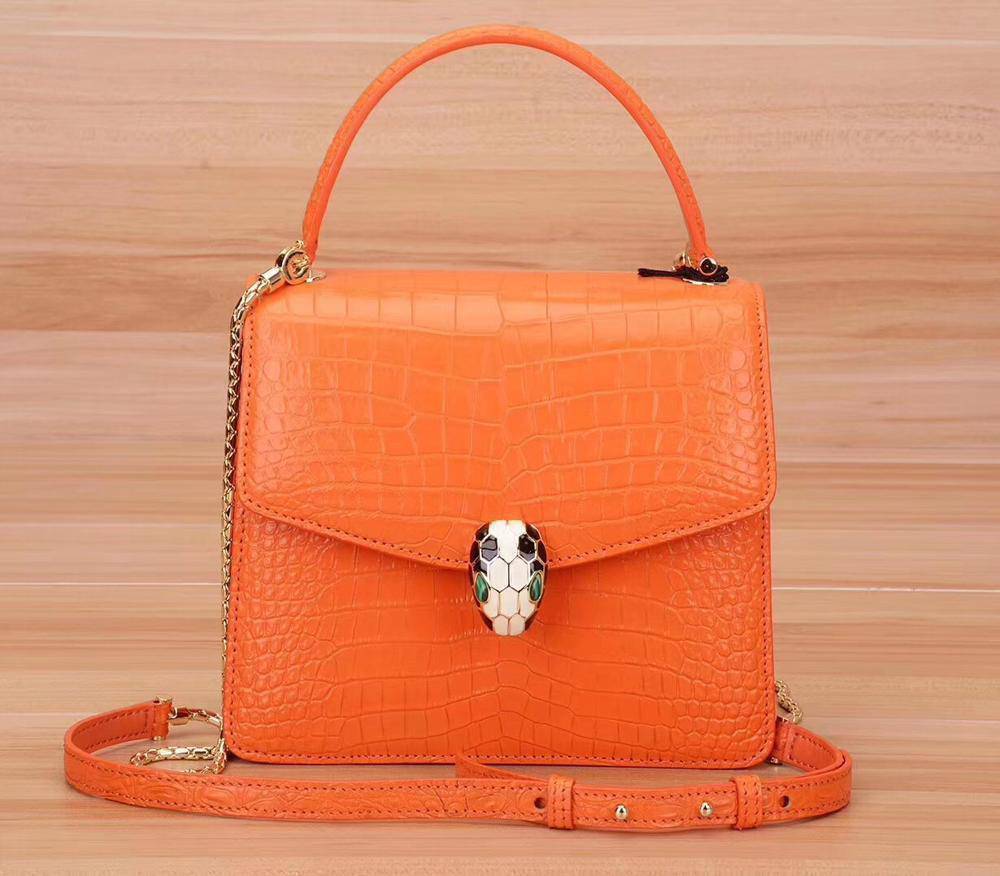 Rossie Viren crocodile leather women's chain crossbody handbag with flap closure, stylish and elegant shoulder bag.