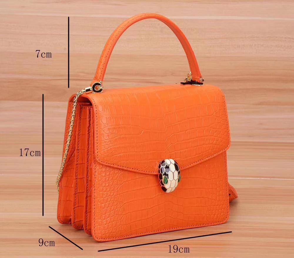 Rossie Viren classic genuine crocodile leather women's chain crossbody handbag with flap closure and shoulder strap.