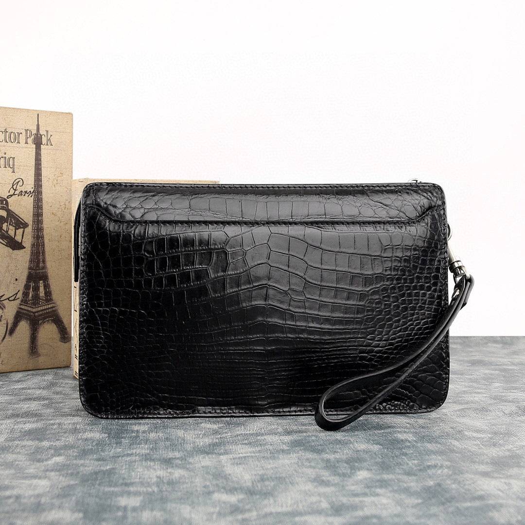 Rossie Viren crocodile leather clutch wallet with large volume, designed for style and practicality in a sleek, textured finish.