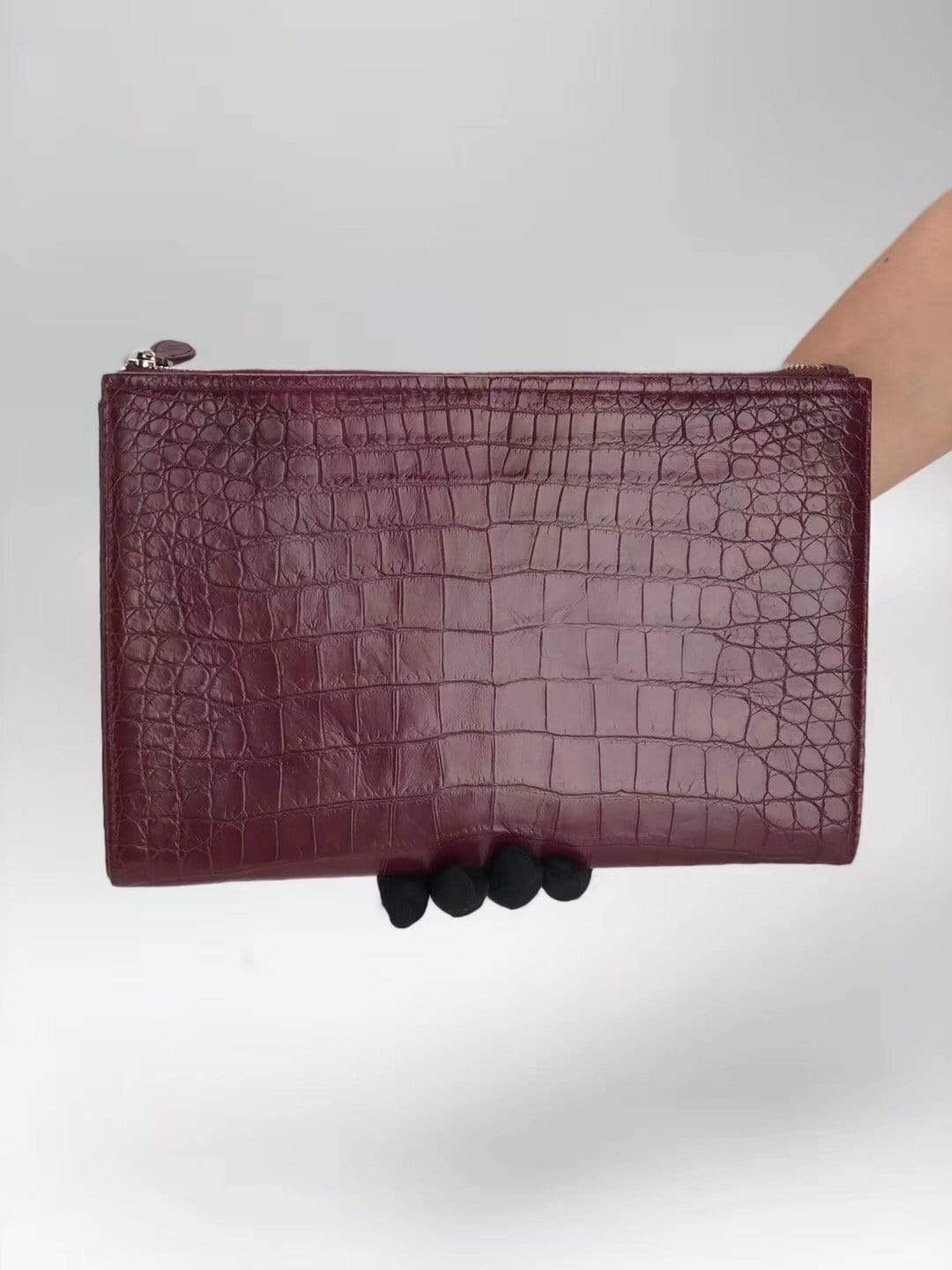 Rossie Viren crocodile belly leather large iPad clutch bag showing textured crocodile pattern and sleek design.