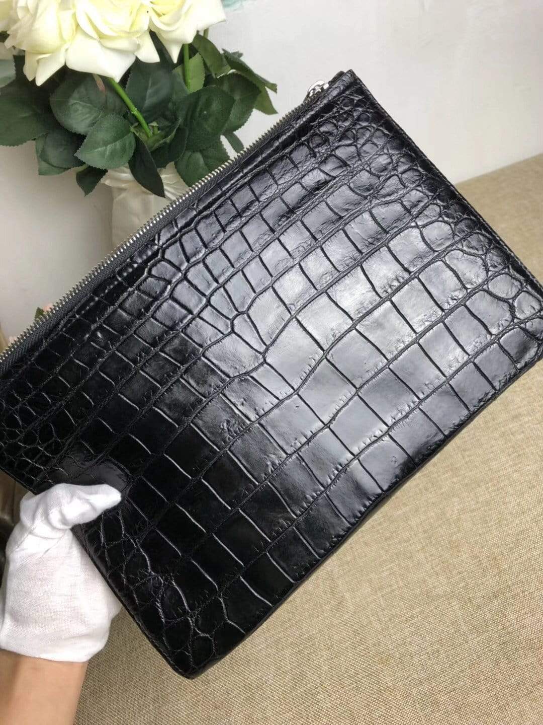 Rossie Viren crocodile belly leather large iPad clutch bag with sleek, textured crocodile pattern and elegant design.