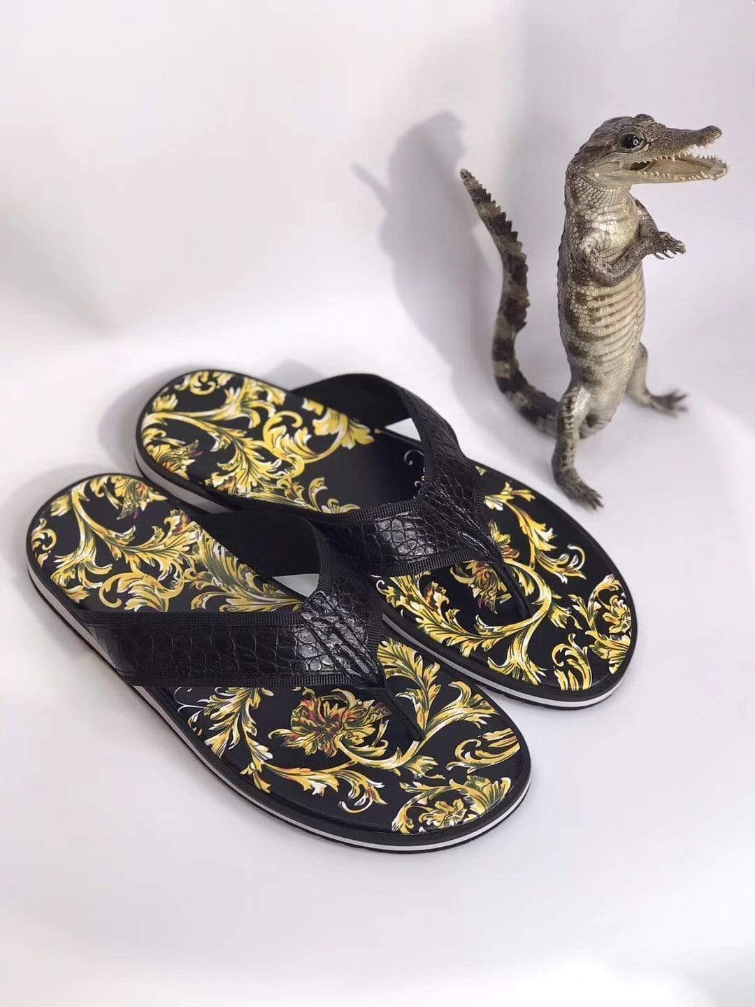 Rossie Viren crocodile belly leather slippers featuring textured crocodile pattern and comfortable slip-on design.