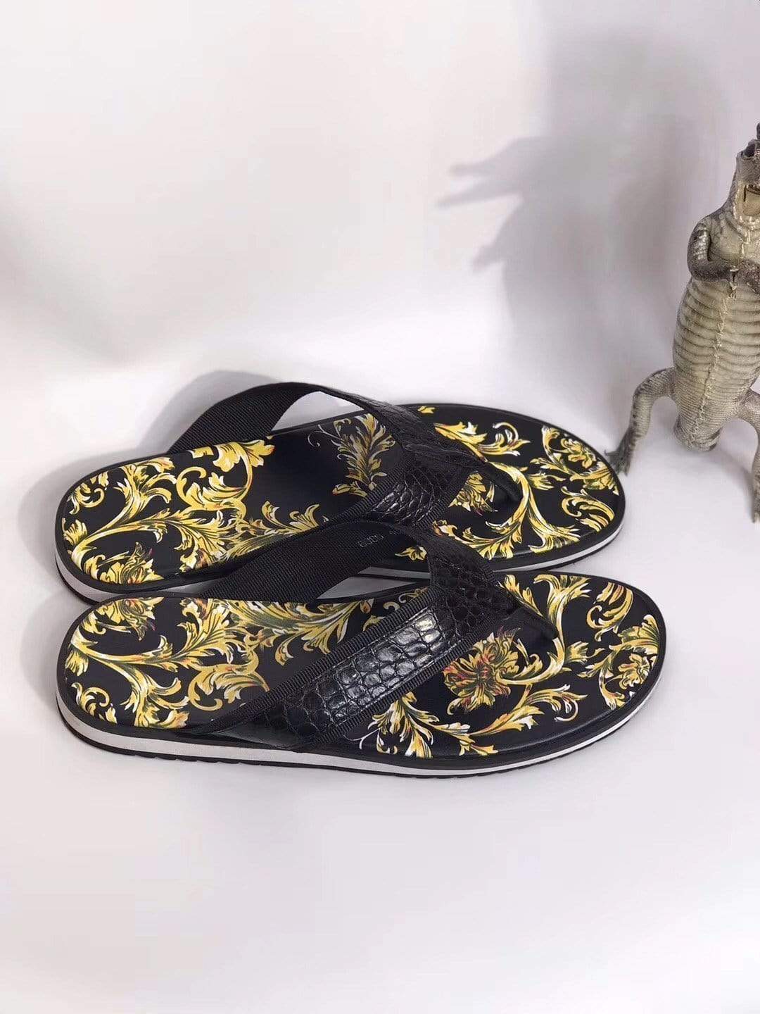 Rossie Viren crocodile belly leather slipper with textured crocodile skin and classic slip-on shoe design.