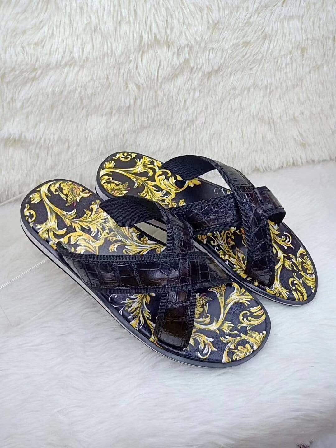 Rossie Viren crocodile belly leather slipper showing detailed crocodile skin texture and classic slip-on shoe design.
