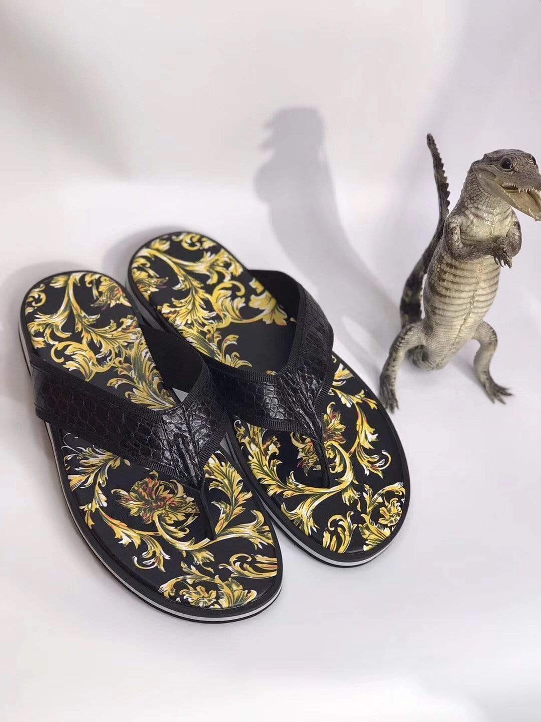 Rossie Viren crocodile belly leather slipper featuring textured crocodile pattern and classic slip-on shoe design.