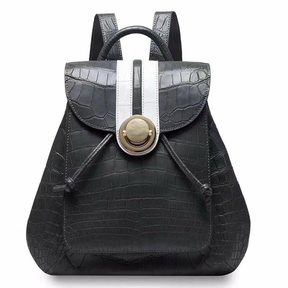 Rossie Viren crocodile belly leather women's handbag backpack featuring a textured crocodile pattern and adjustable straps.
