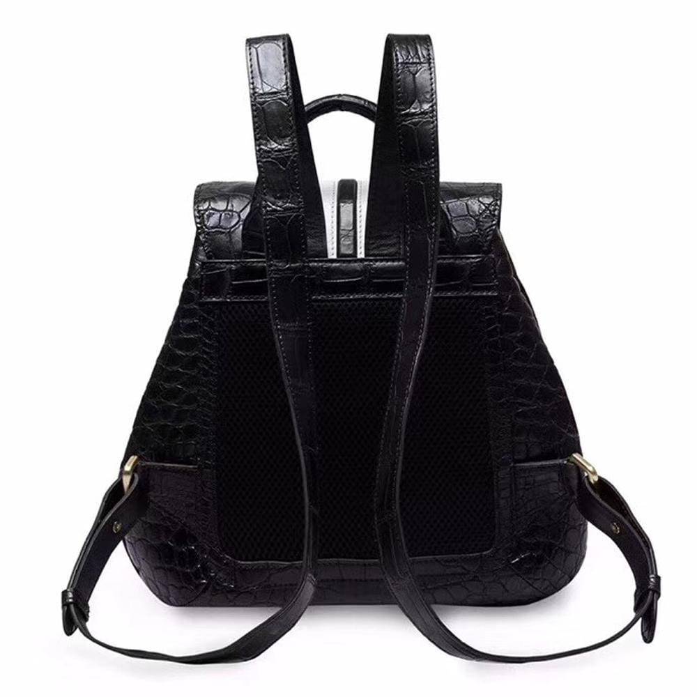 Crocodile belly leather women's backpack handbag by Rossie Viren, featuring textured crocodile pattern and adjustable straps.