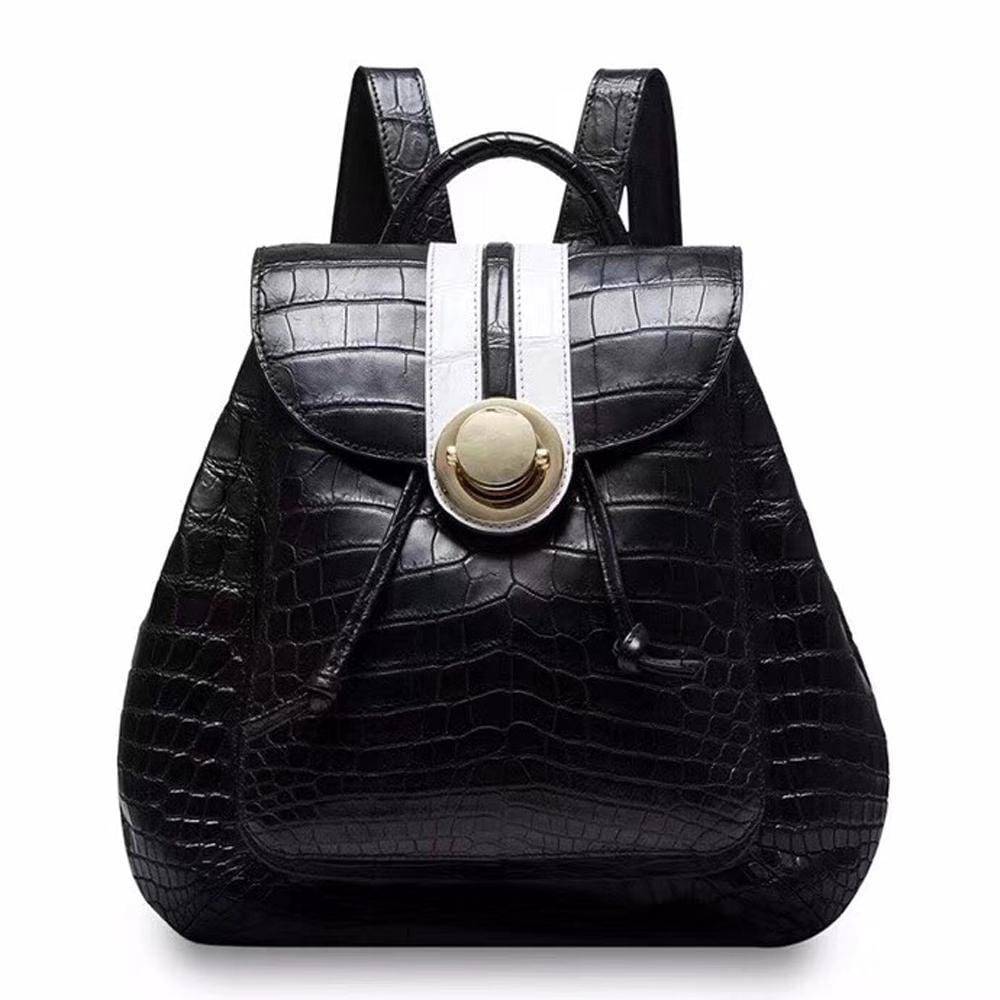 Rossie Viren crocodile belly leather women's backpack handbag with textured exterior and adjustable straps.