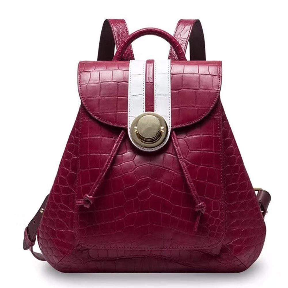 Rossie Viren crocodile belly leather women's backpack handbag with textured crocodile pattern and adjustable straps.