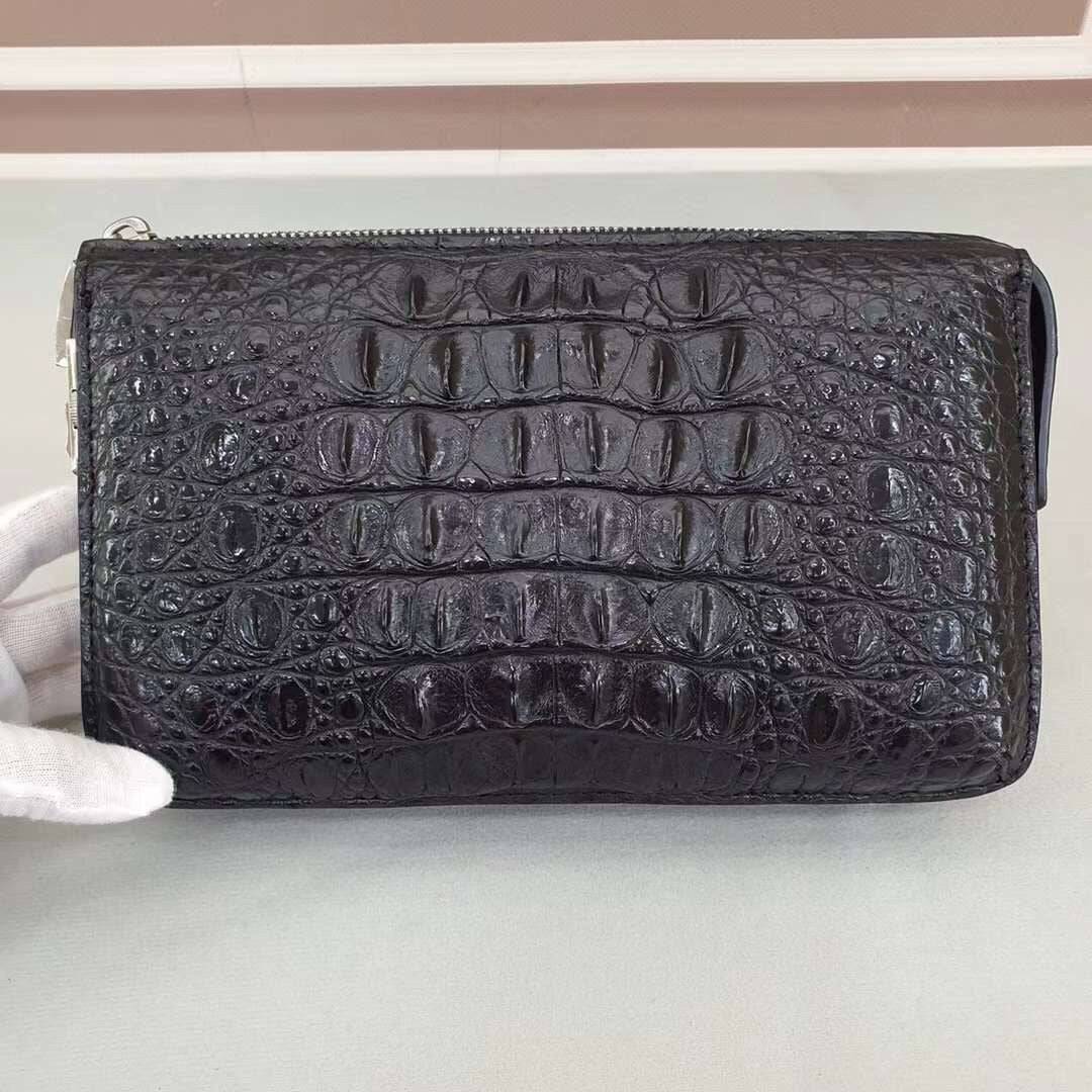 Rossie Viren crocodile bone leather clutch bag with sleek design and textured crocodile pattern, ideal for elegant occasions.