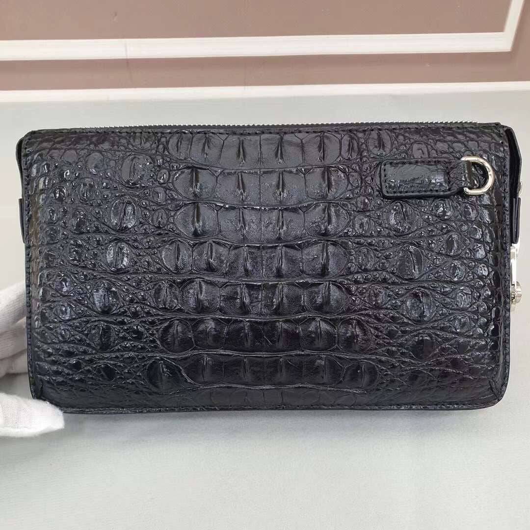 Black Crocodile Bone Leather Clutch Bag with Band String by Rossie Viren, featuring a sleek, textured design and elegant closure.