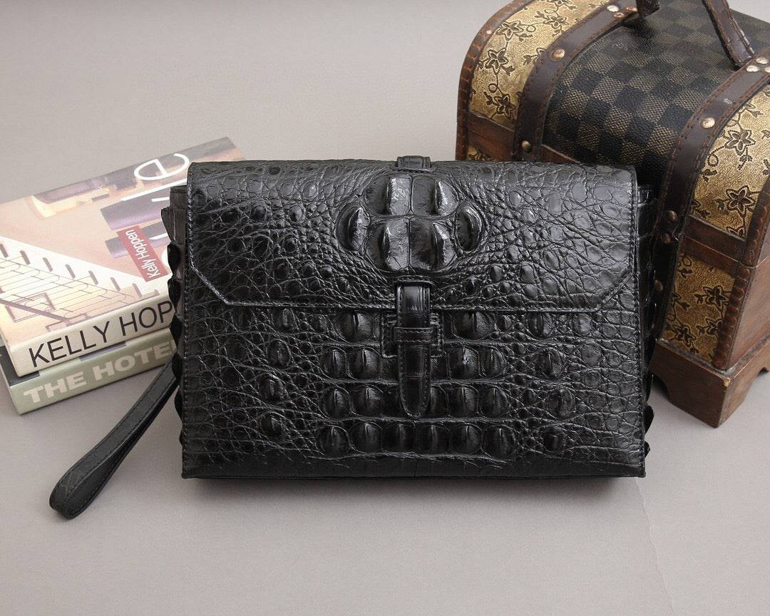 Rossie Viren crocodile bone leather clutch bag with sleek design and textured crocodile pattern, ideal for elegant occasions.