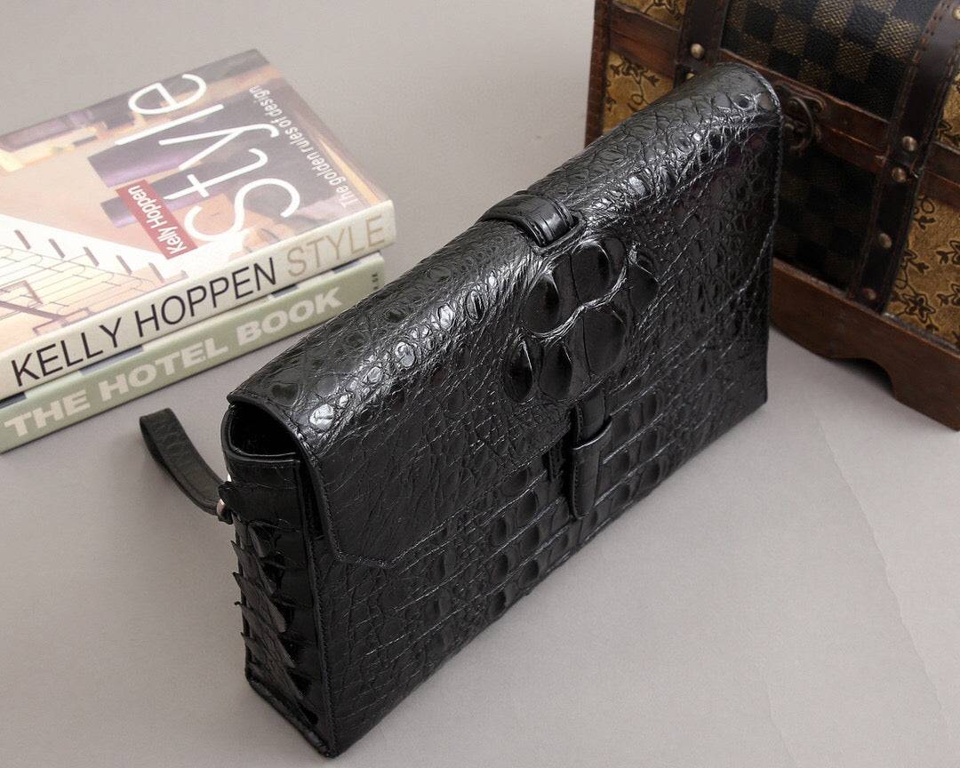 Rossie Viren crocodile bone leather clutch bag with sleek design and textured crocodile pattern, perfect for elegant evening outings.