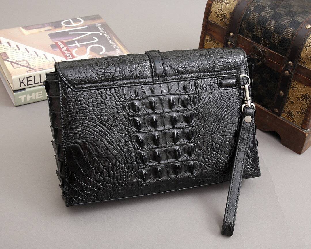 Rossie Viren crocodile bone leather clutch bag with textured design and sleek finish, perfect for elegant occasions.