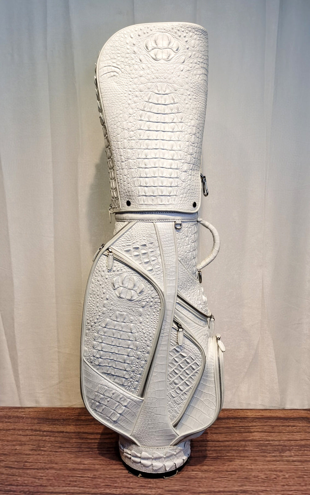 White Crocodile Bone Leather Golf Bags from Rossie Viren, including golf sets, cart bags, and stand bags, with a luxurious textured finish.