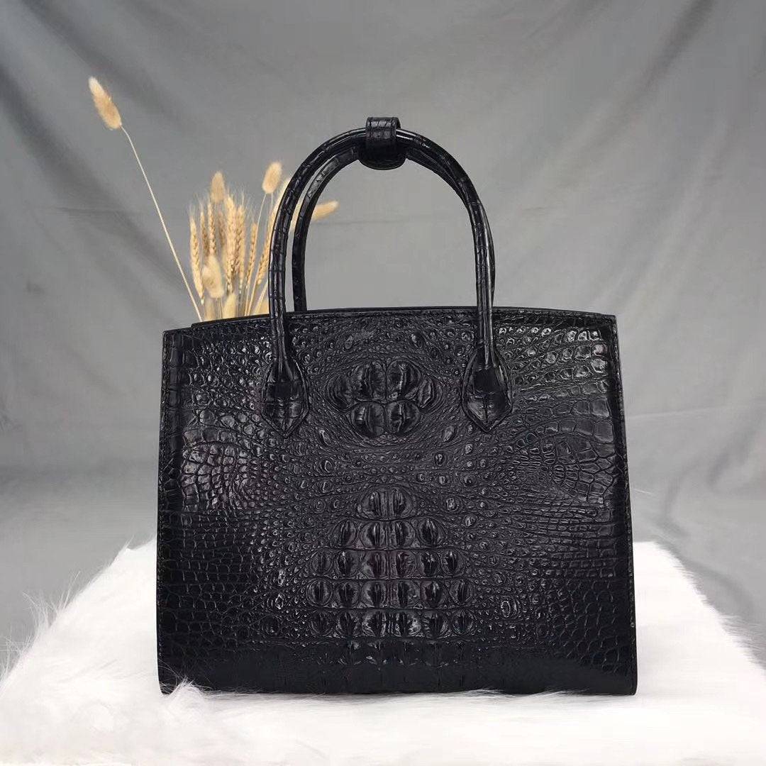 Rossie Viren crocodile bone leather handbag with top handle, featuring a sleek and stylish design for elegant everyday use.