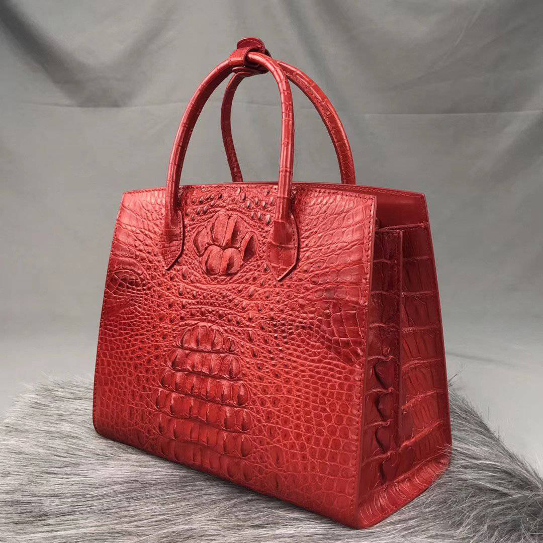 Rossie Viren crocodile bone leather handbag with top handle, featuring a luxurious textured crocodile pattern and elegant design.