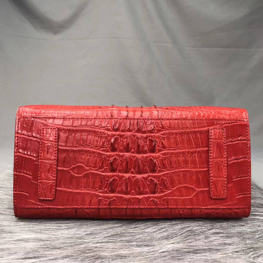 Rossie Viren crocodile bone leather handbag with top handle, featuring a luxurious textured crocodile pattern and elegant design.
