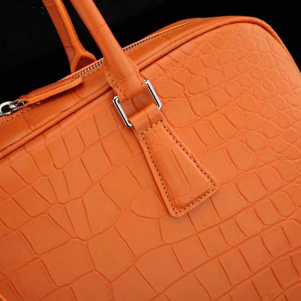 Orange Rossie Viren crocodile leather briefcase with a sleek design, perfect for carrying laptops and professional essentials.