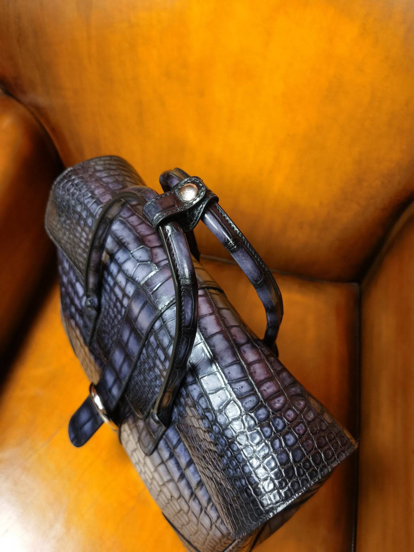 Vintage grey genuine crocodile leather briefcase by Rossie Viren, featuring a sleek design and sturdy handles for professional use.