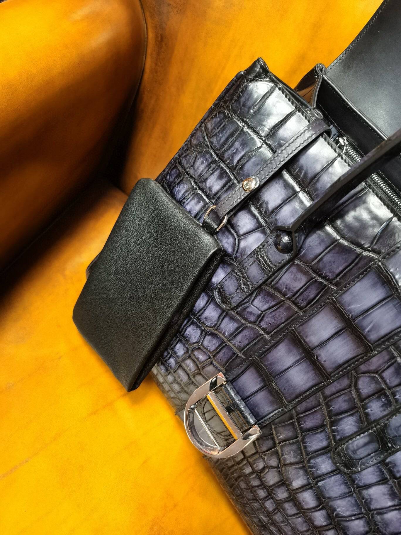 Vintage grey genuine crocodile leather briefcase by Rossie Viren, featuring a sleek design and sturdy handles for laptop storage.