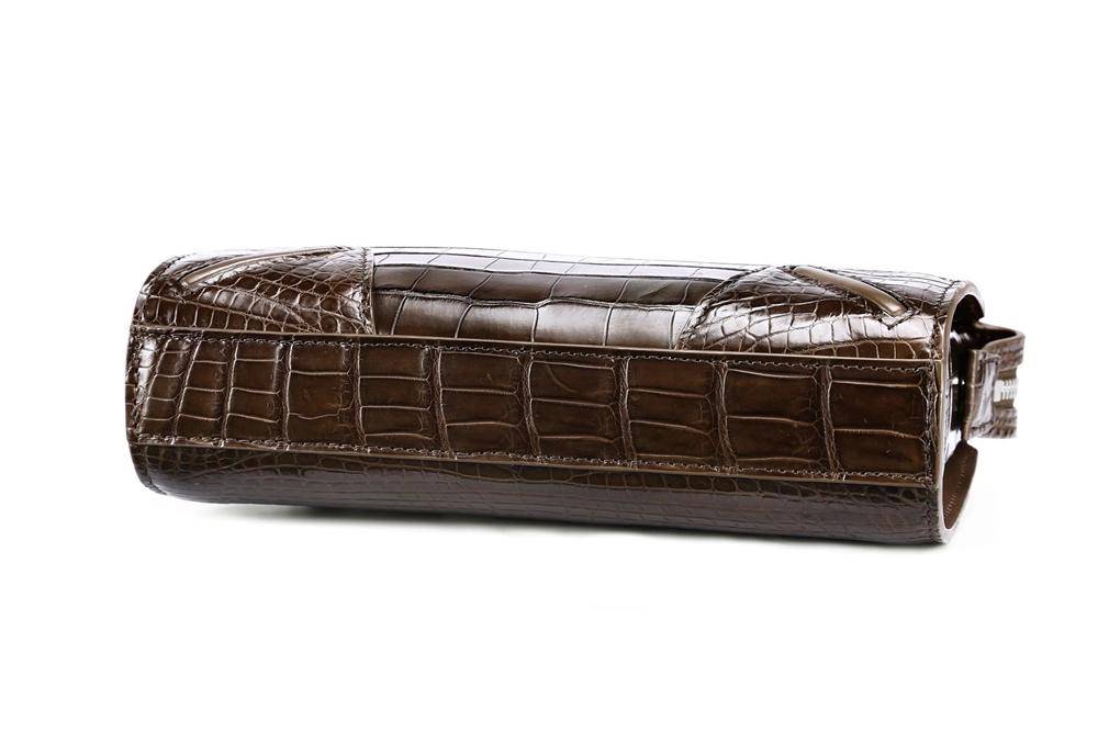 Rossie Viren crocodile belly leather wallet with code lock and wrist strap, designed as a stylish business clutch.