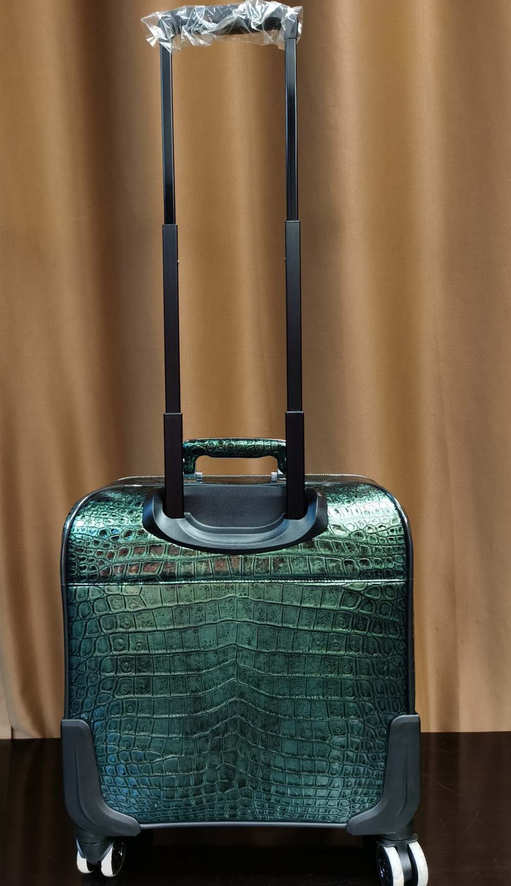 Dark green Crocodile Leather 15-inch mini carry-on suitcase by Rossie Viren, featuring a compact, stylish design with leather texture.