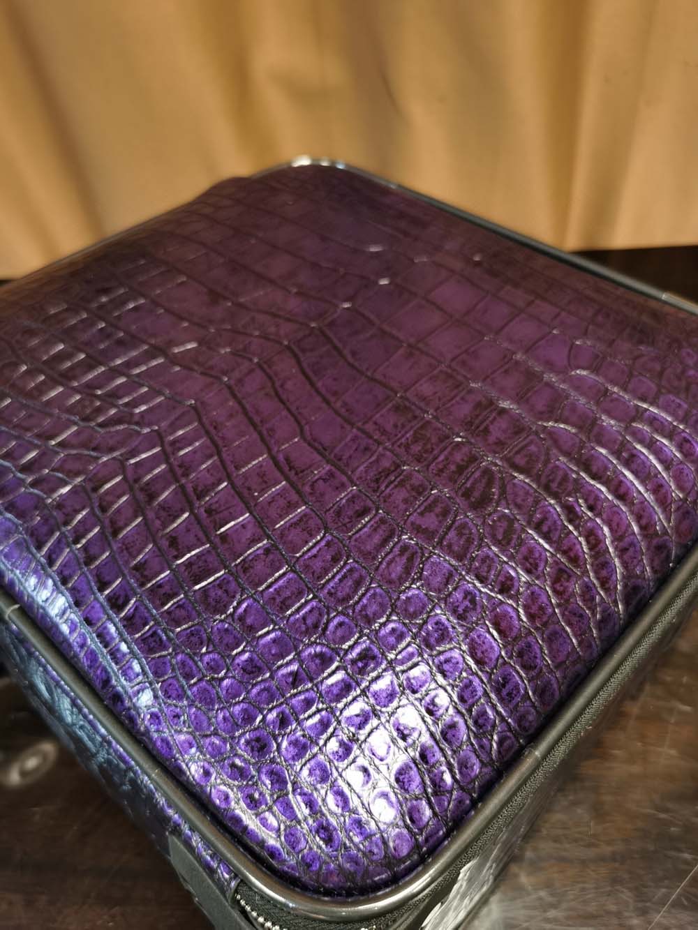 Purple crocodile leather 15-inch mini carry-on suitcase by Rossie Viren, featuring textured crocodile pattern and compact design.