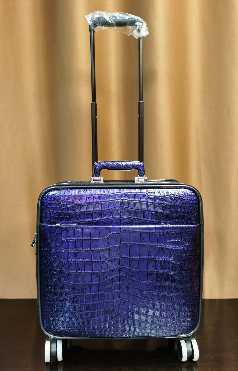 Purple crocodile leather 15-inch mini carry-on suitcase by Rossie Viren, featuring a textured crocodile pattern and compact design.