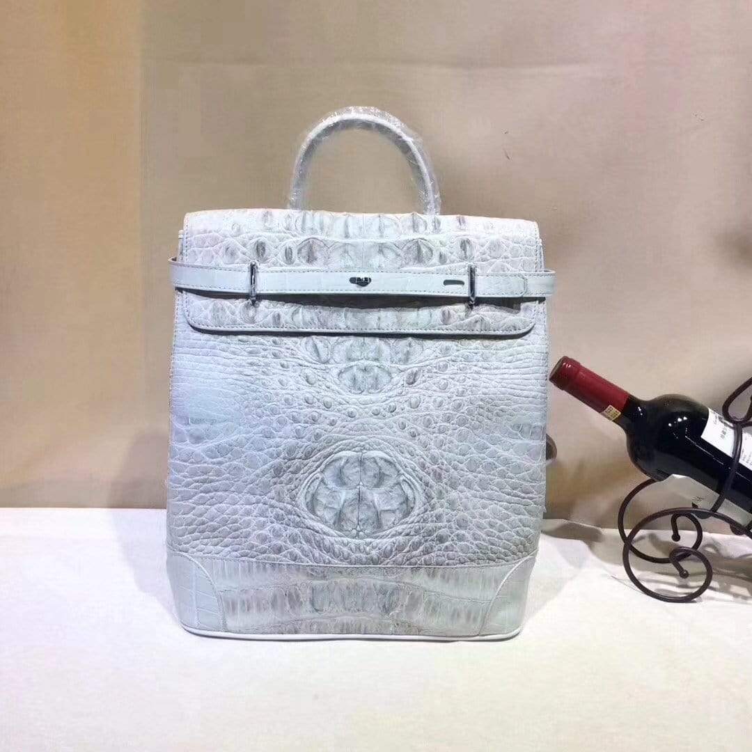 Rossie Viren crocodile leather backpack handbag with sleek, textured crocodile pattern and adjustable shoulder straps.