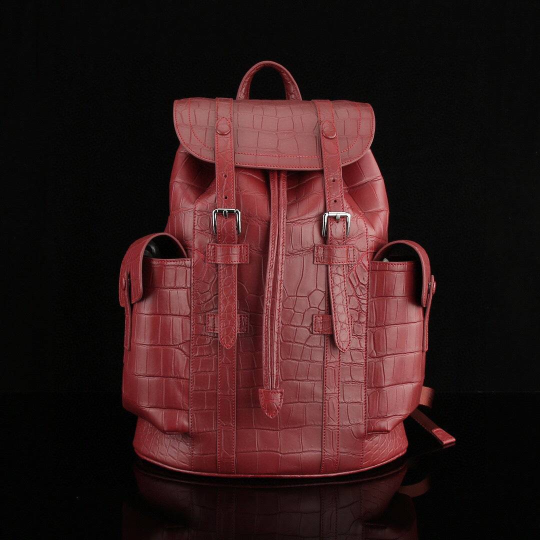 Rossie Viren crocodile leather backpack in wine red with detailed crocodile texture and sturdy straps, stylish and elegant.