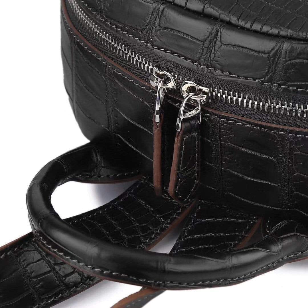 Black crocodile leather backpack handbag for women by Rossie Viren, featuring a sleek design and durable craftsmanship.