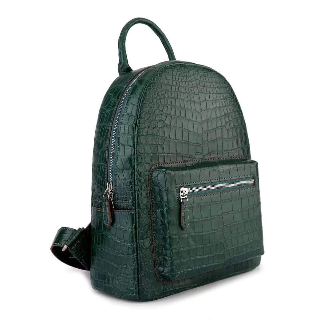 Dark green crocodile leather handbag for women by Rossie Viren, featuring a stylish and textured backpack design.
