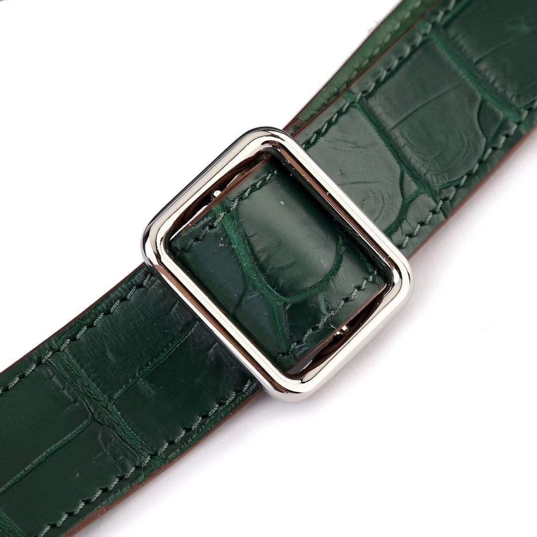 Dark green crocodile leather handbag for women by Rossie Viren, featuring a stylish backpack design with textured leather.