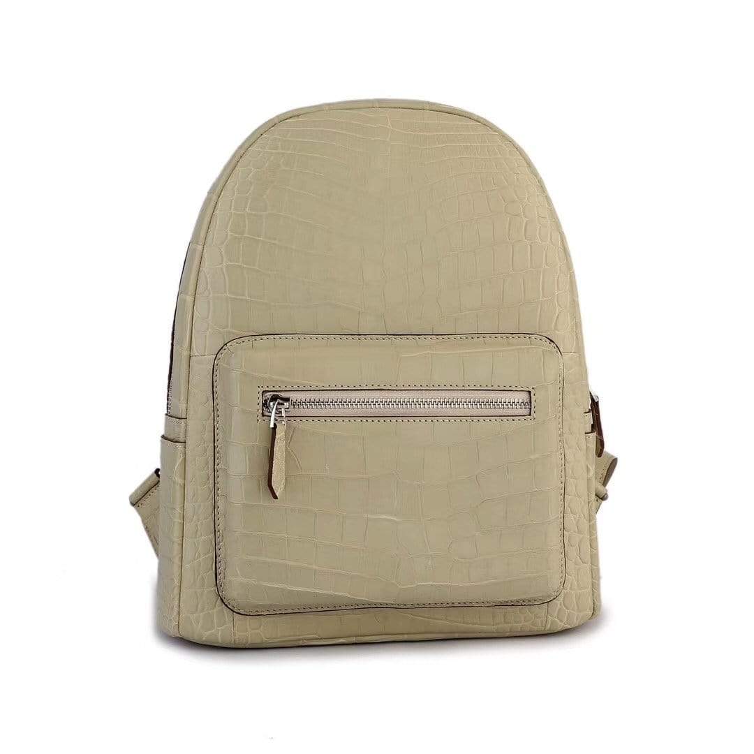 Cream crocodile leather handbag for women by Rossie Viren, stylish backpack with textured crocodile pattern and adjustable straps.