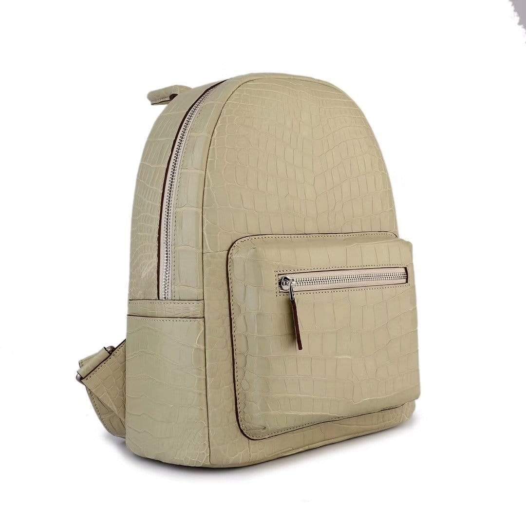 Cream crocodile leather backpack handbag for women by Rossie Viren, featuring a textured crocodile pattern and stylish design.