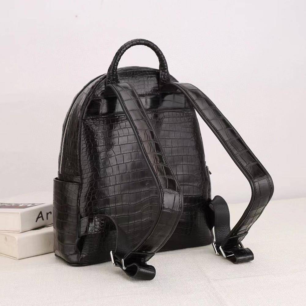 Elegant Rossie Viren crocodile leather backpack for women with sleek design, featuring textured crocodile pattern and adjustable straps.