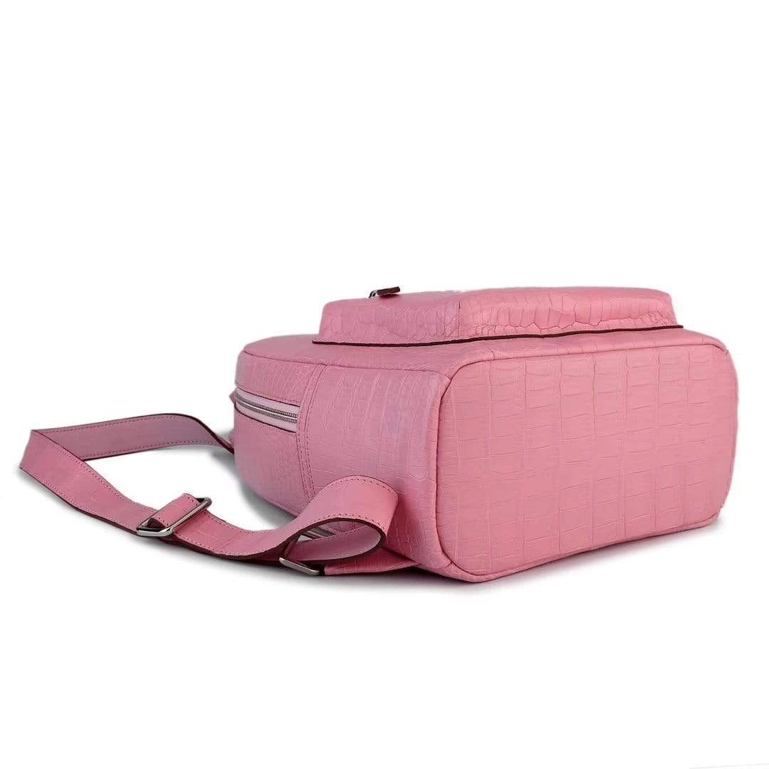 Pink crocodile leather handbag for women by Rossie Viren, stylish backpack with textured crocodile pattern and top handle.