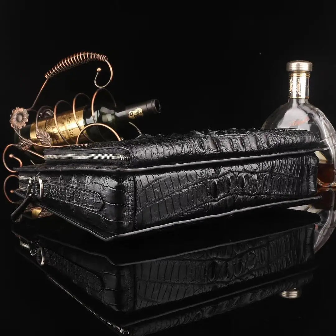 Rossie Viren crocodile leather briefcase handbag with handles, designed for laptops and computers, showcasing a luxurious textured finish.
