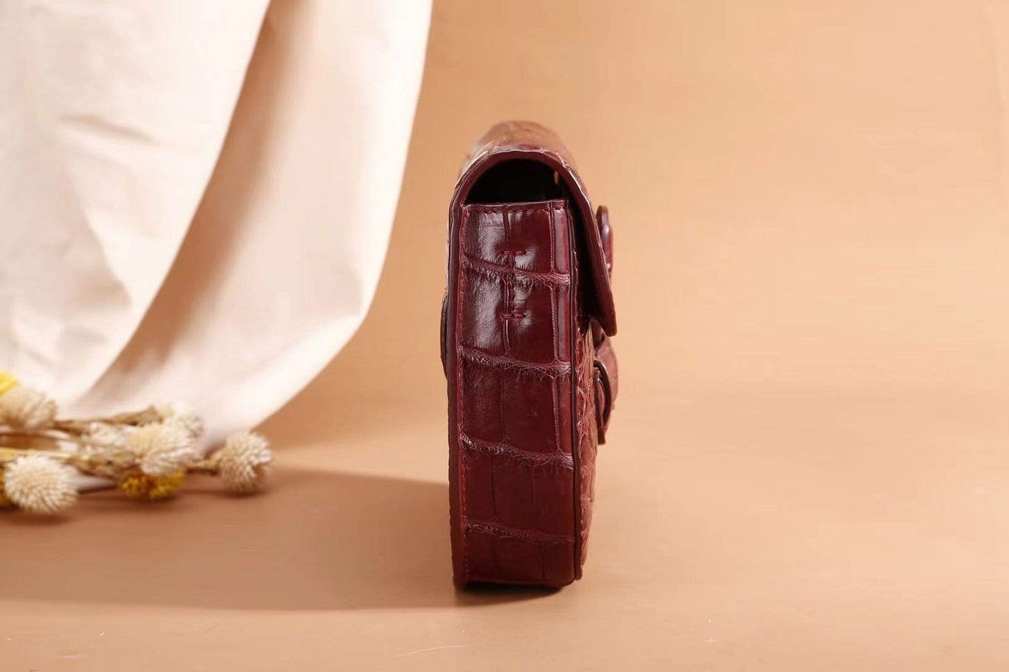 Crocodile leather waist belt messenger bag for girls from Rossie Viren, featuring a stylish and compact handbag design.