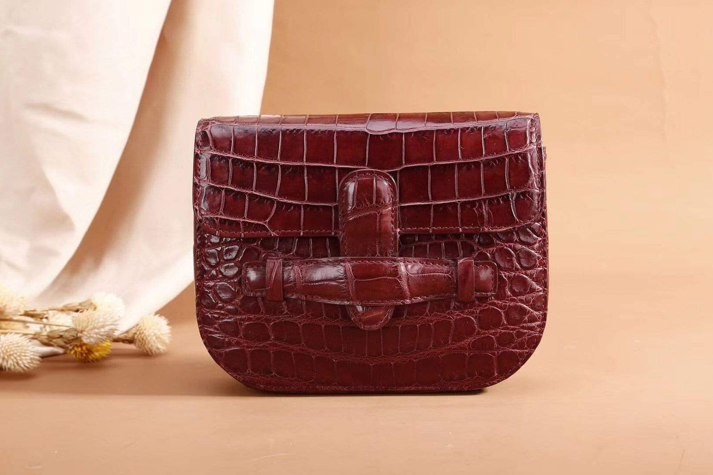 Rossie Viren crocodile leather waist belt messenger bag for girls, showcasing the textured crocodile pattern and compact handbag design.