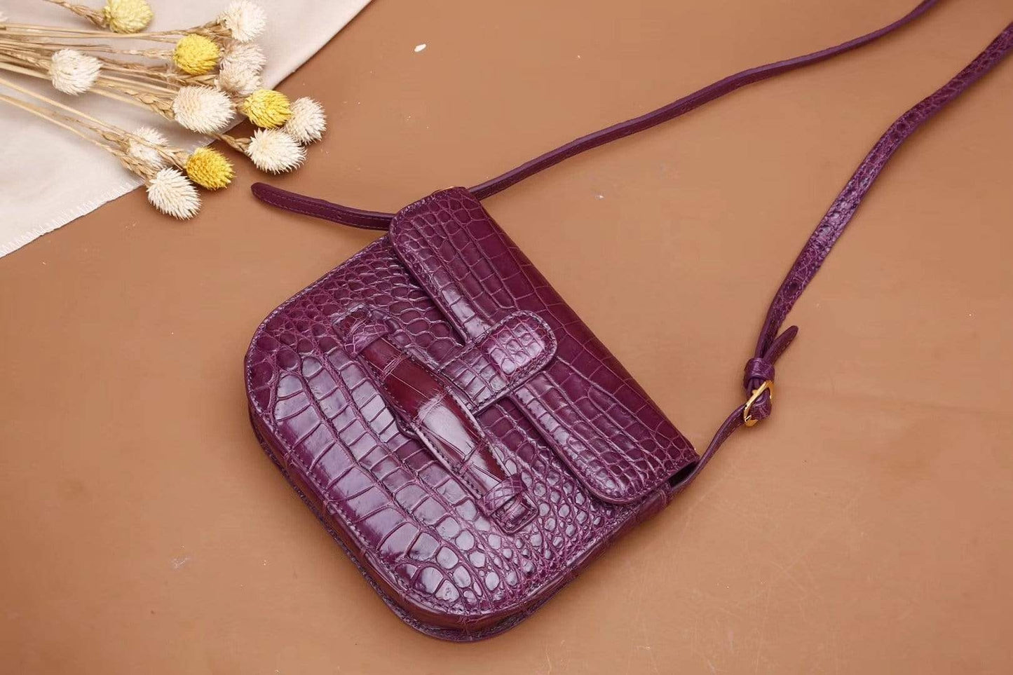 Crocodile leather bum waist belt messenger bag for girls by Rossie Viren, featuring a compact design and crocodile texture.