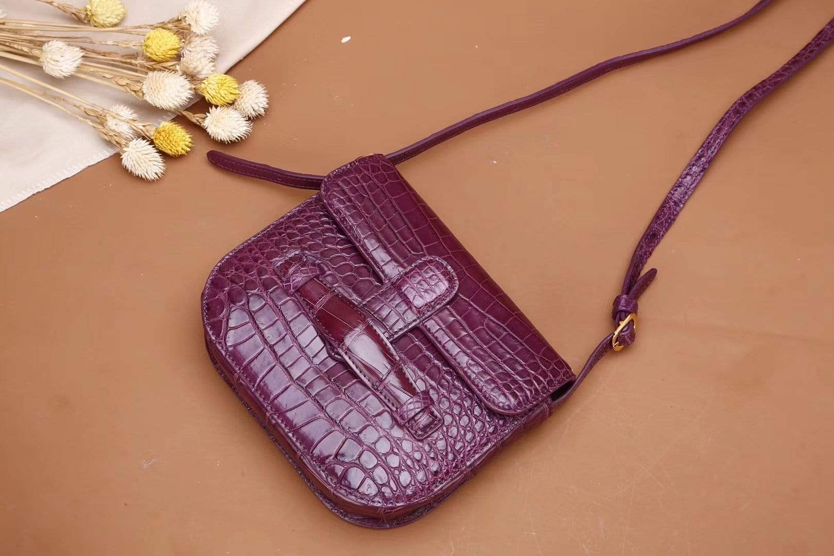 Crocodile leather bum waist belt messenger bag for girls by Rossie Viren, featuring a compact design and crocodile texture.