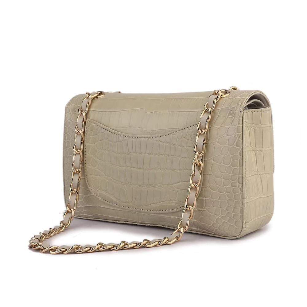 Beige crocodile leather shoulder handbag with classic flap and chain strap for women by Rossie Viren.