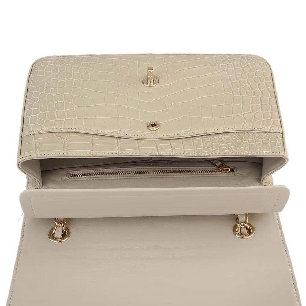 Beige crocodile leather shoulder handbag with classic flap and chain strap for women by Rossie Viren.