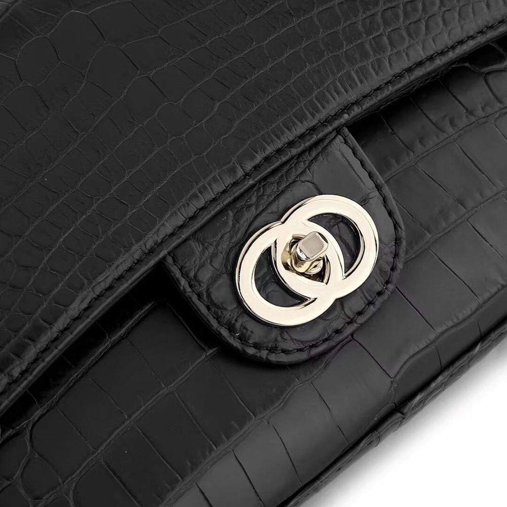 Black crocodile leather shoulder handbag with classic flap and chain strap by Rossie Viren for women.