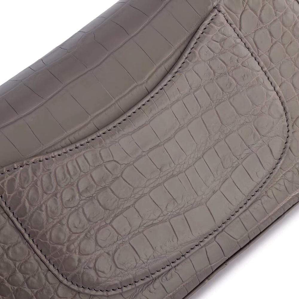Grey crocodile leather shoulder bag with classic flap and chain strap from Rossie Viren, designed for women.