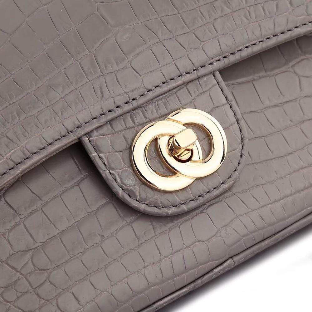 Grey crocodile leather shoulder handbag with classic flap and chain strap by Rossie Viren for women.